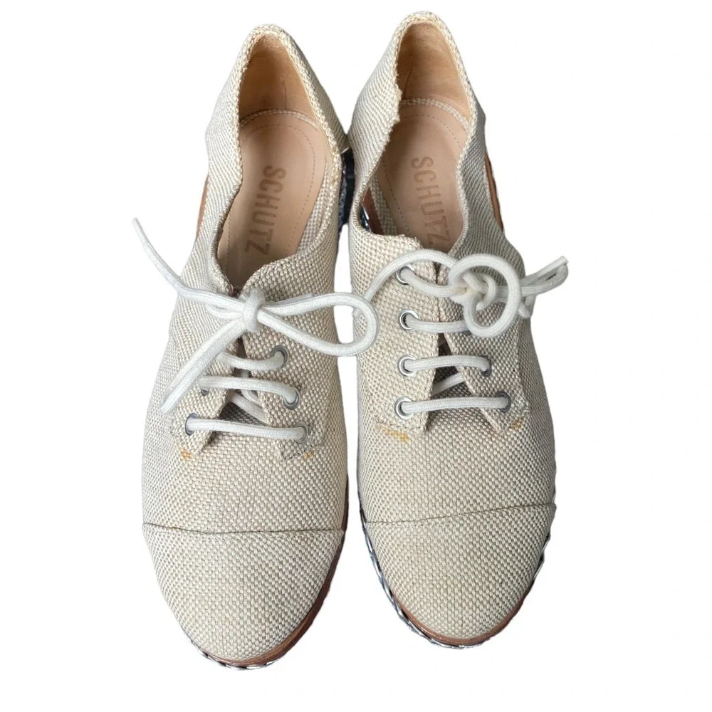 SCHUTZ Cream Lace-Up Platform Wedges with Silver Braided Sole